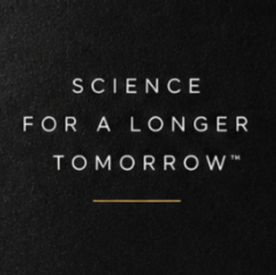 A square black textured background with centered white text reading 'SCIENCE FOR A LONGER TOMORROW' and a short gold horizontal line underneath.